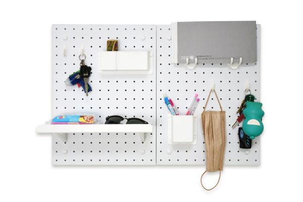 Pegboard placed in the entryway, holding frequently used items for going out.